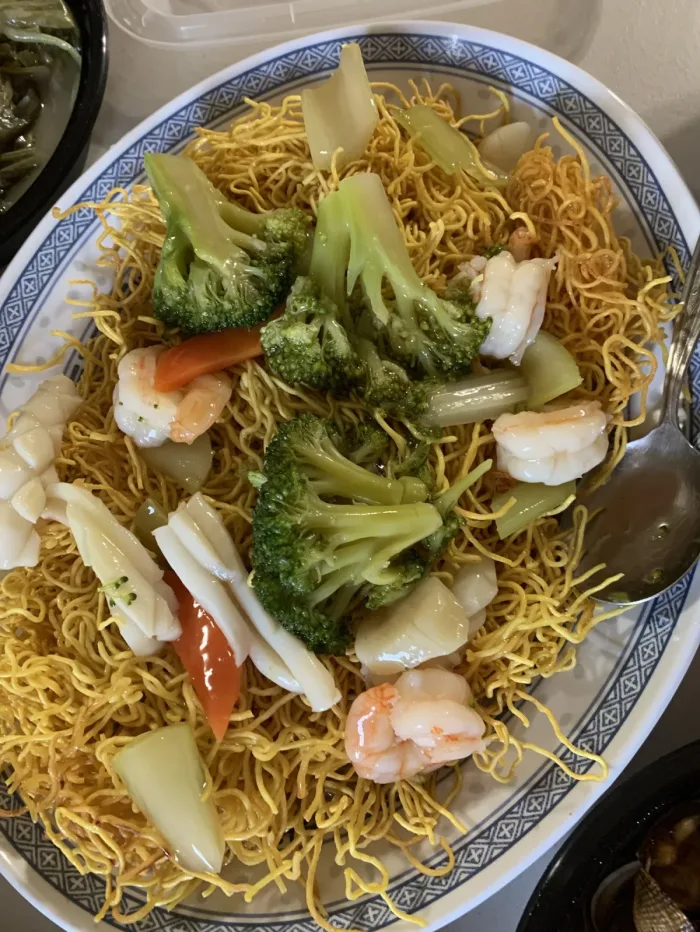 Shrimp chow mein stir-fried in the wok at Trithis, a Cantonese Chinese restaurant in Mississauga